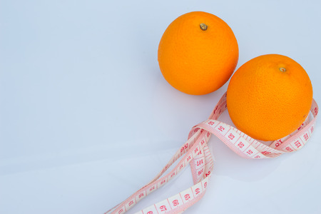 Orange  and measuring tape. Deit conceptの写真素材