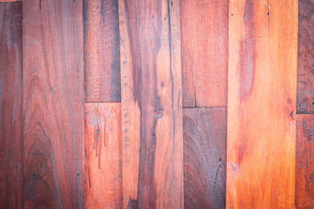 Plates stacked wooden pieces were dark brown wood surface. background ,with vignette
