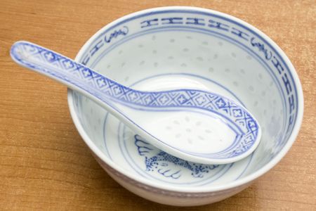 asian spoon and bowl made of fine chinaの写真素材