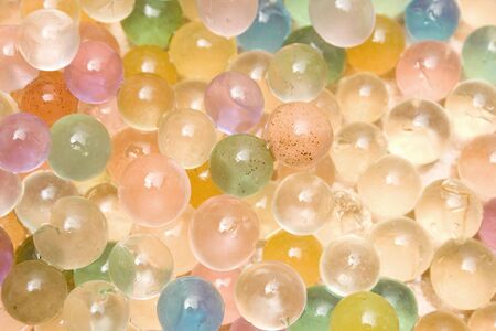 A pattern created by some colorfull rubber ballsの写真素材