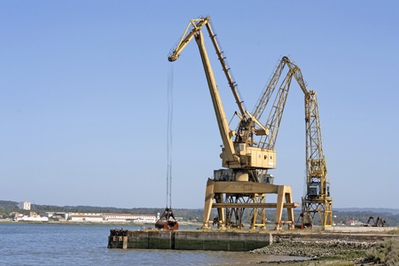 One giant, yellow crane for industrial purposeの写真素材