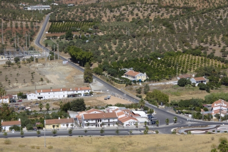 A vilage in the foregrownd with spain plains in the background の写真素材