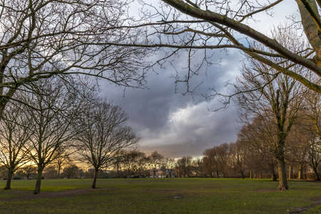 Sunset at a regents park in unted kingdom on a overcast skyの写真素材
