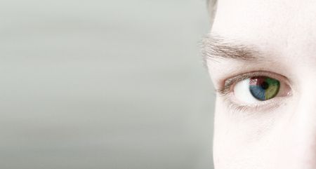 A close up of a cybersport men's eye (in color)の写真素材