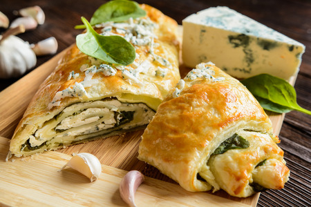 Savory strudel stuffed with spinach, Roquefort, Feta cheese and garlicの写真素材
