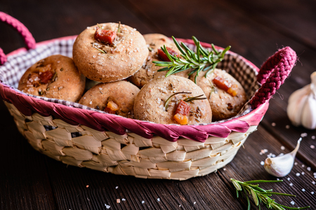Savory rye flour buns with Schwarzwald ham, garlic, cumin, rosemary and Himalayan saltの写真素材