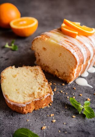 Fresh loaf of orange bread with sugar coatingの写真素材