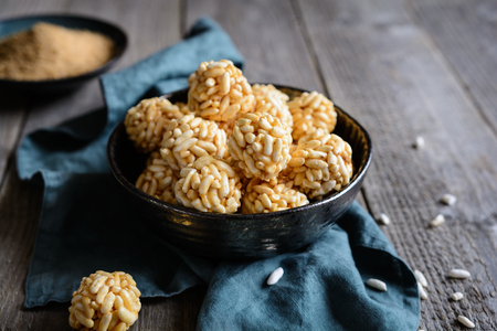 Delicious sweet puffed rice balls with caramelの写真素材