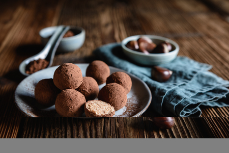 Delicious chestnut truffles coated with cocoa powderの写真素材