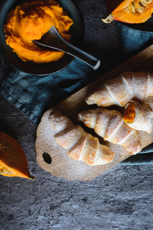 Sweet crescent rolls stuffed with pumpkin pureeの写真素材