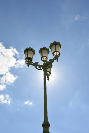 Streetlight over blue skyの写真素材