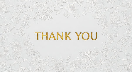 Thank you text on white paper with floral pattern, top view.の素材