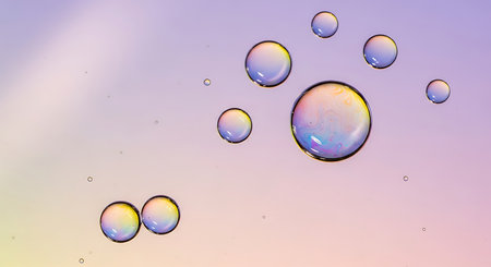 Soap bubbles on colorful background. Close up of soap bubbles.の素材