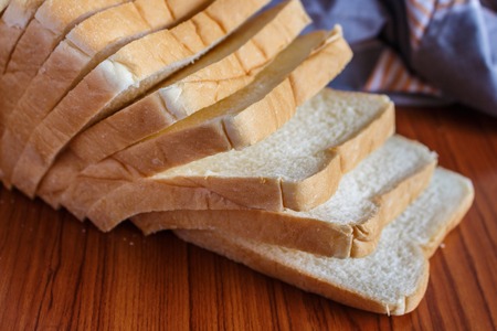 fresh sliced bread, one slicedの写真素材