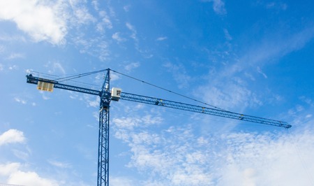 Construction Crane on the sky with cloudの写真素材