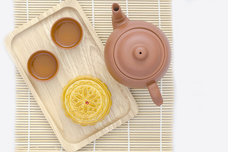 Mooncake with tea on white backgroundの写真素材