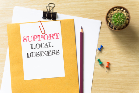 Self Improvement, message on the white paper / business concept / wood desk , copy space / business concept / view from above, top viewの写真素材