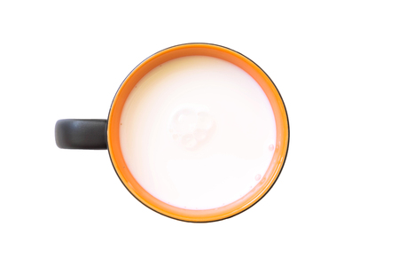 Top view of glass milk in glass. Isolated on white background. Round copy space in center.の写真素材
