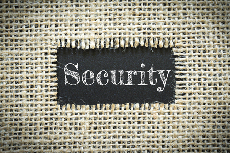 Text Security on paper black has Cotton yarn background you can apply to your product.の写真素材
