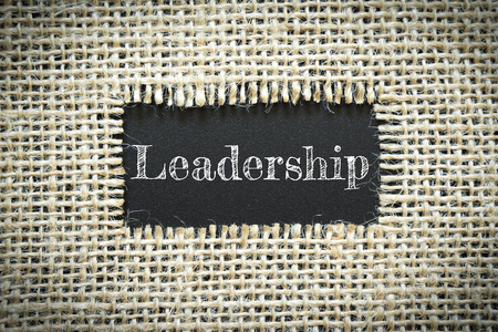 Text Leadership on paper black has Cotton yarn background you can apply to your product.の写真素材