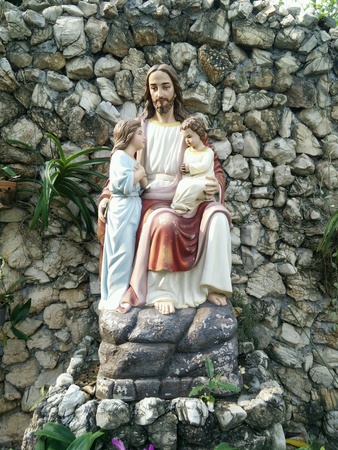 Statue Jesus inside garden in the church at Bangkok, Thailand.の素材
