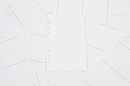 Blank note paper on white background with copy space for text.