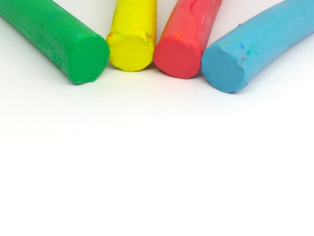 Colorful bar plasticine clay on white backgroundの写真素材