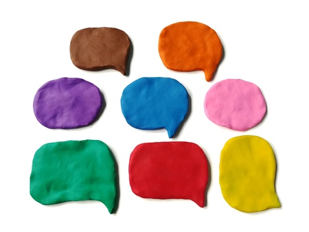 Colorful abstract shape made from plasticine clay on white background, Speech bubble doughの写真素材