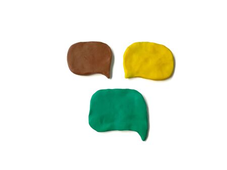 Colorful different abstract shape made from plasticine clay on white background, Speech bubble doughの写真素材