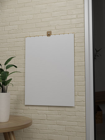 A blank piece of paper hanging on a brick wallの写真素材