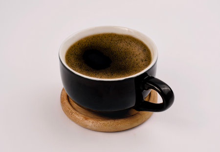a cup of black coffee, isolated on a white backgroundの写真素材