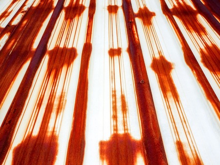 pattern of a rusty metal building wallの写真素材