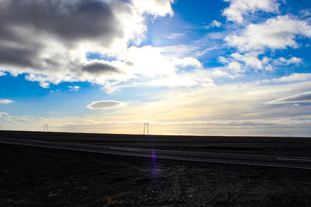 power lines in Iceland at sunriseの写真素材