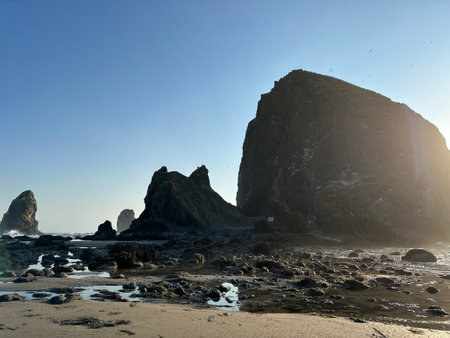 Rocks on the beach at sunset in Asturias, Spainの素材