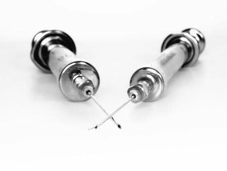 two old medical syringes from glassの写真素材