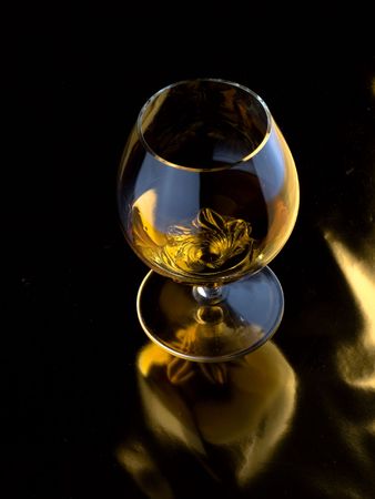 alcoholic beverage in glass on a dark backgroundの写真素材