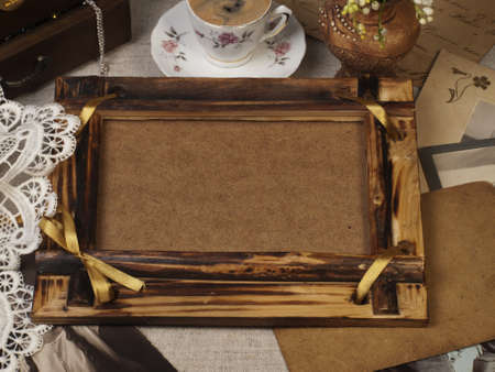 Still life with old pictures and frame for a photoの写真素材
