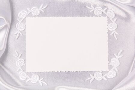card for text and weddings accessories on white silkの写真素材