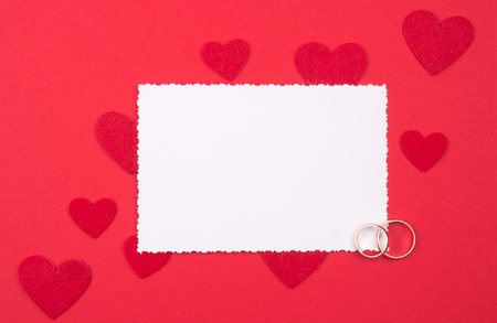 White card for congratulation on a background from red backgoundの写真素材