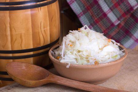 Pickled cabbage homemade on the tableの写真素材