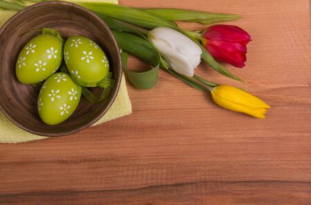 Easter eggs and fresh spring flowers