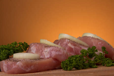 Pieces  of pork on a cook-table