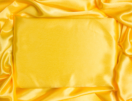 Celebratory background of yellow silkの写真素材