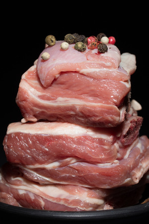 Chunks of fresh bacon before cooking closeupの写真素材