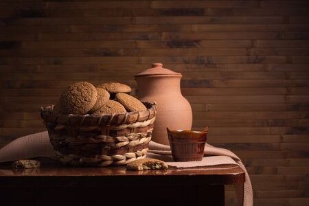 Vintage still life with cookies in a basketの写真素材