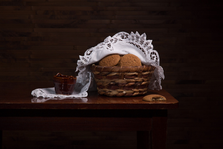 Vintage still life with cookies in a basketの写真素材