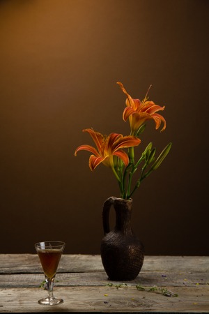 Still-life with a bouquet of lily flowersの写真素材