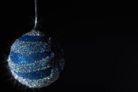 Christmas concert with blue accessories on a dark backgroundの写真素材