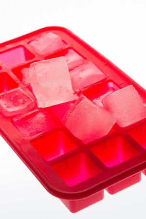 Ice pieces for different drinks in the form of freezingの写真素材