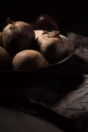 Red juicy beetroot on a dark backgroundの写真素材